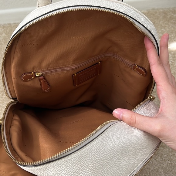 Coach cream colored backpack. 3 pockets (2 big, 1 small) - Picture 7 of 11